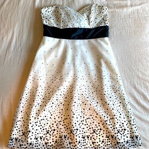 Ivory and black cocktail dress.